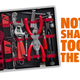 A photo of a box full of red-handled tools with the caption "Not the sharpest tool in the shed."